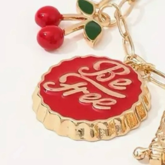 Gold toned dainty and fun Charm Necklace cherries, heart, boot and crystals - Picture 8 of 17